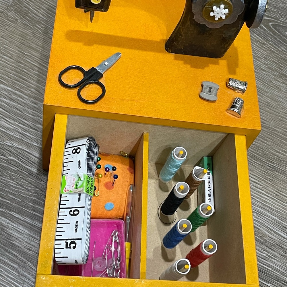 Authentic sewing kit box with supplies